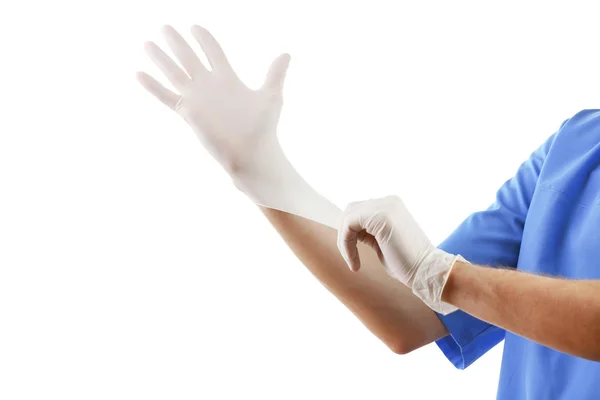 Doctor putting on sterile gloves — Stock Photo, Image