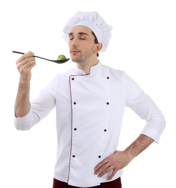 Chef with spoon of broccoli — Stock Photo, Image