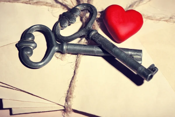 Keys with heart on  letters — Stock Photo, Image