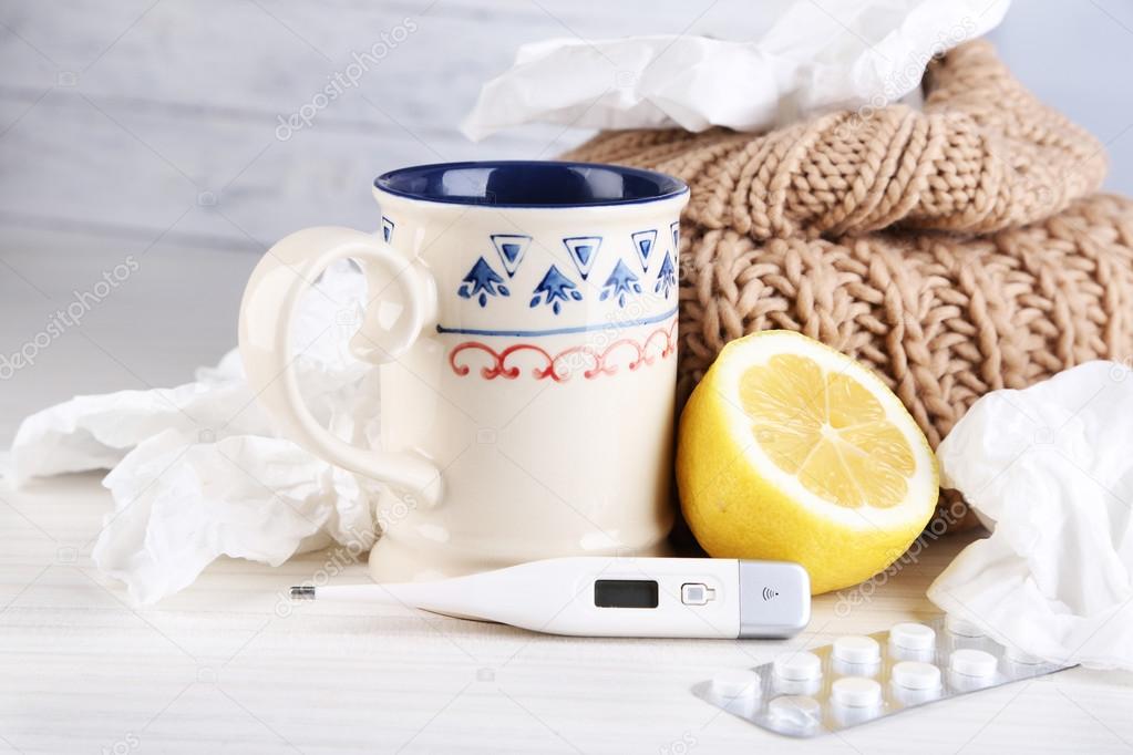 tea for colds, pills and handkerchiefs