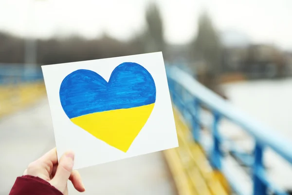 Heart with painted Ukraine flag — Stock Photo, Image