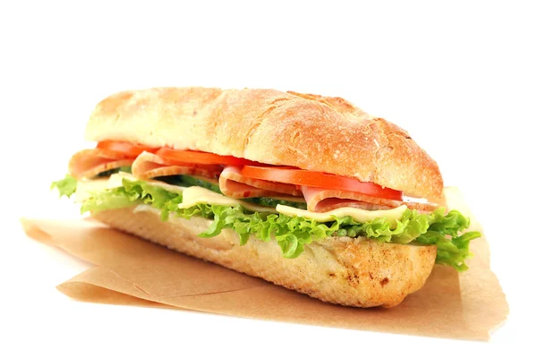 Fresh sandwich on parchment isolated on white — Stock Photo, Image