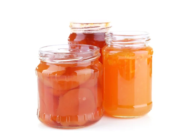 Homemade jars of fruits jam isolated on white background — Stock Photo, Image
