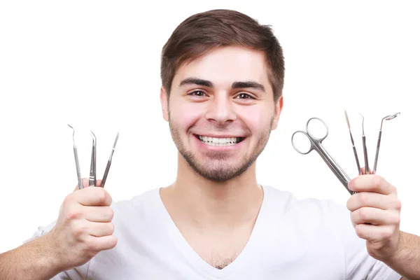 Homem com ferramentas dentárias — Fotografia de Stock