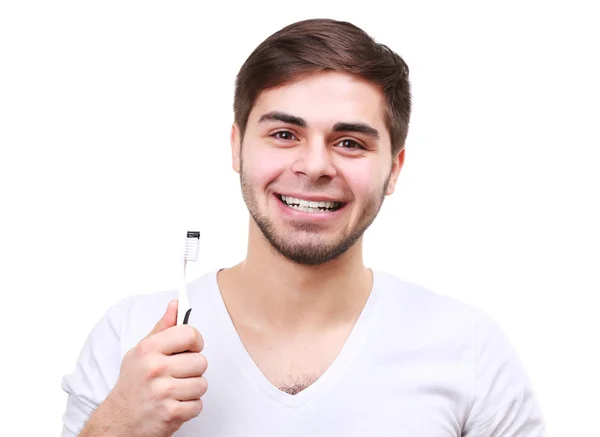 Hombre con cepillo de dientes — Foto de Stock