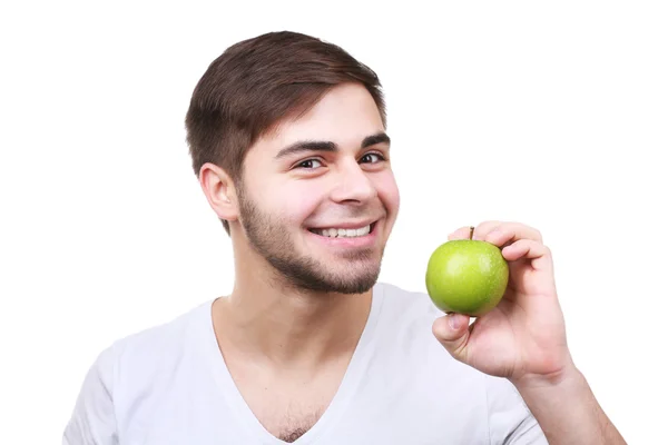 Ritratto di giovane con mela verde isolato su bianco — Foto Stock