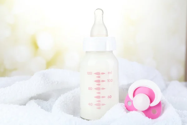 Baby milk bottle and pacifier — Stock Photo, Image