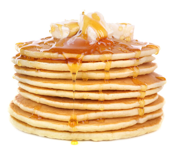 Stack of delicious pancakes with butter and honey isolated on white