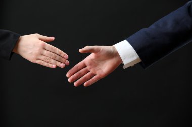 İş karşılıklı koyu arka plan üzerinde