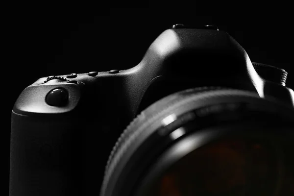 Digital camera on dark background — Stock Photo, Image