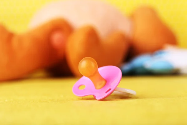 Dummy for baby, close-up, on bright background — Stock Photo, Image