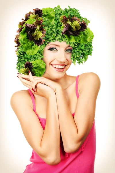 Beautiful young woman with vegetable wig isolated on white — Stock Photo, Image