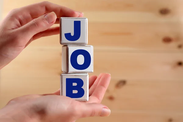 Job word spelled with wooden cubes — Stock Photo, Image