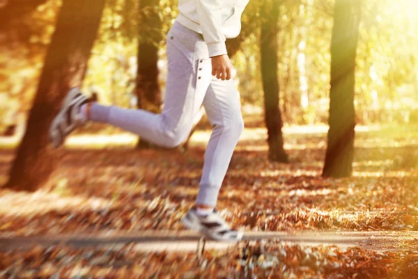 Young man jogging at park