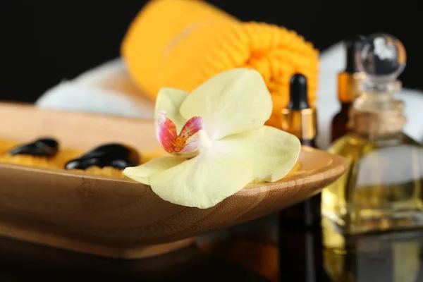 Beautiful spa composition with orchid on dark background — Stock Photo, Image