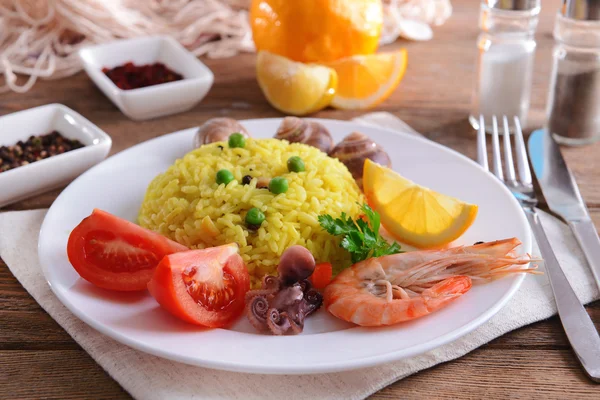 Seafood Paella on plate on table close-up — Stock Photo, Image