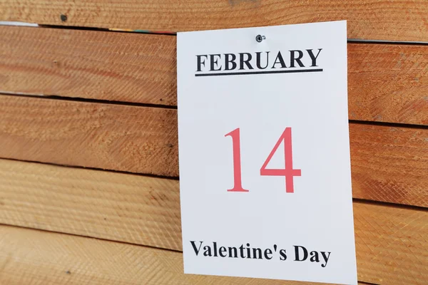 Valentines Day, February 14 on calendar on wooden background — Stock Photo, Image