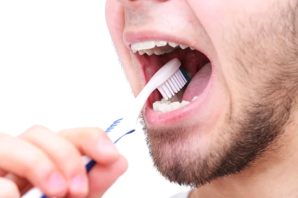 Homme avec brosse à dents isolé sur blanc — Photo