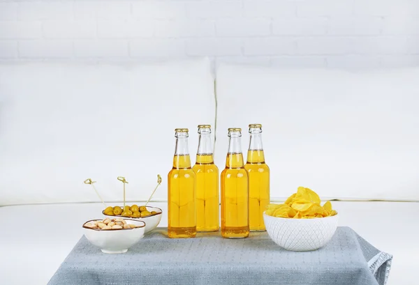 Table at home with food and drinks for friends — Stock Photo, Image