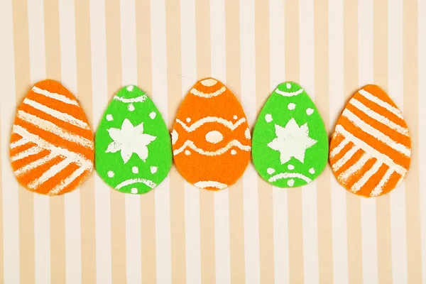 Felt Easter eggs on craft paper background — Stock Photo, Image