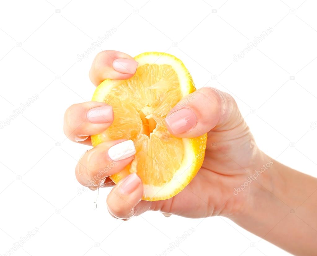 Female hand squeezing lemon isolated on white Stock Photo by ©belchonock 65347983
