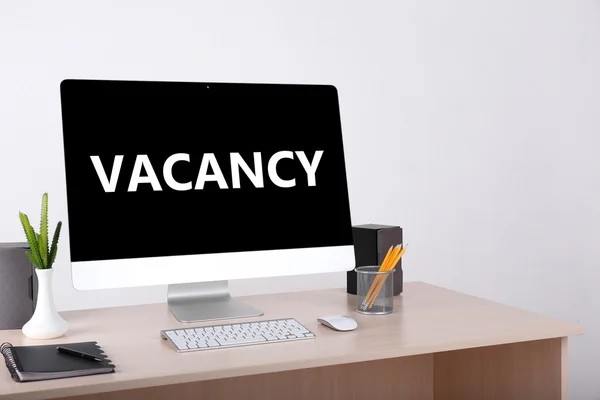 Office workplace with vacancy sign — Stock Photo, Image