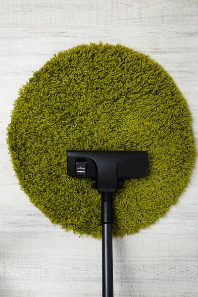 Vacuum cleaner to tidy up carpet — Stock Photo, Image