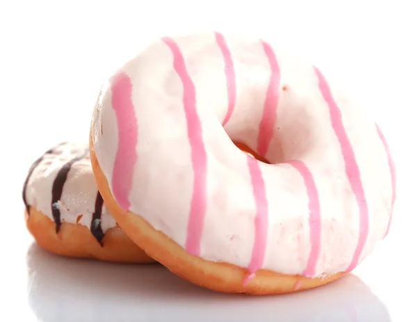 Deliciosos donuts com gelo isolado em branco — Fotografia de Stock