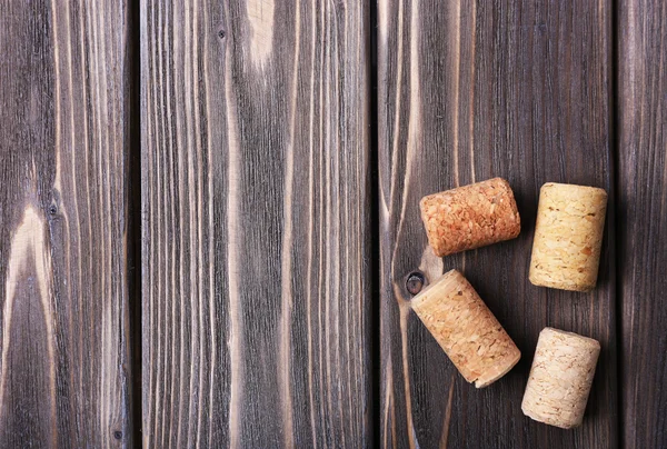 Wine corks on wooden background — Stock Photo, Image