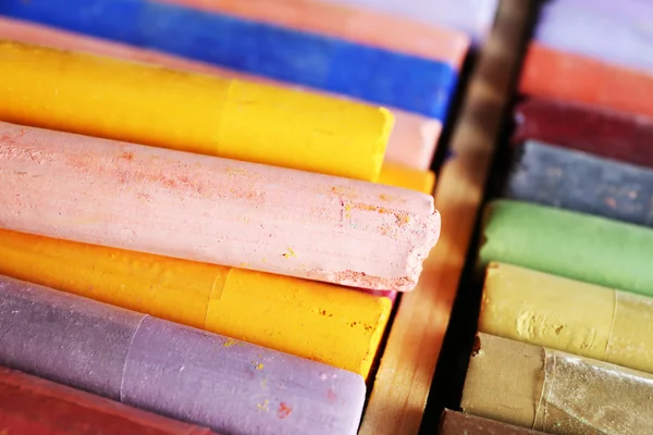 Colorful chalk pastels in box close up — Stock Photo, Image