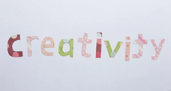 Word creativity written on paper close up — Stock Photo, Image