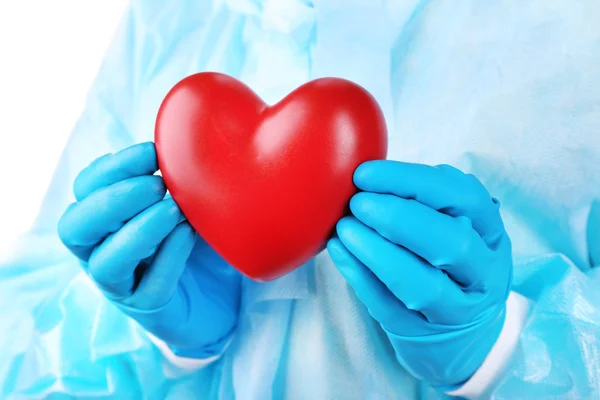 Decorative heart in doctors hands, close-up — Stock Photo, Image