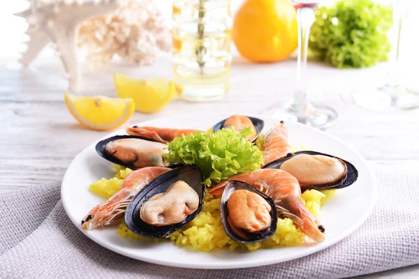 Seafood Paella on plate on table close-up — Stock Photo, Image