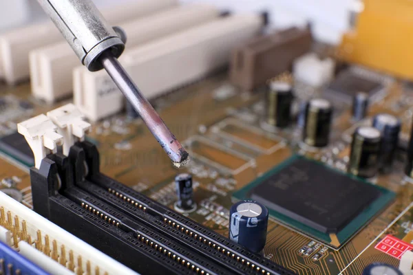 Repairing of motherboard, macro view — Stock Photo, Image