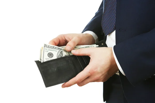 Bőr pénztárca, pénzzel férfi kezében elszigetelt fehér background — Stock Fotó