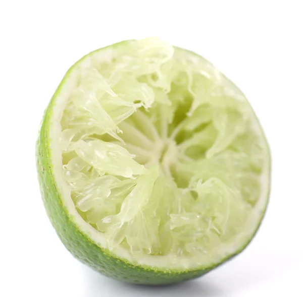 Squeezed lime isolated on white — Stock Photo, Image