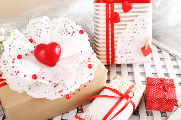 Handmade gifts on Valentine Day, on fabric background — Stock Photo, Image