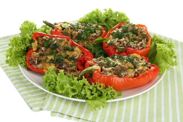 Stuffed red peppers on plate on napkin close up Stock Image