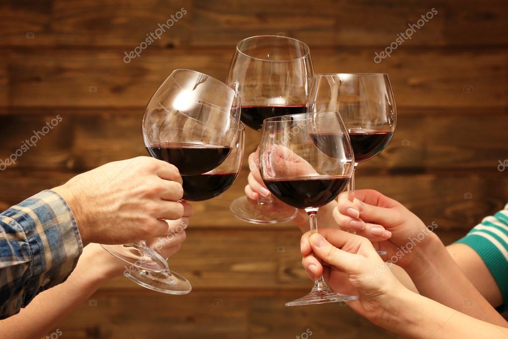 depositphotos_65421197-stock-photo-clinking-glasses-of-red-wine.jpg