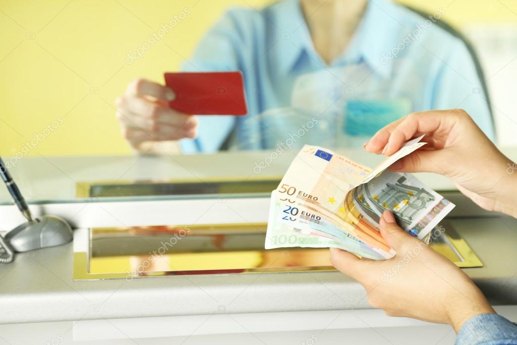 Teller window with working cashier 
