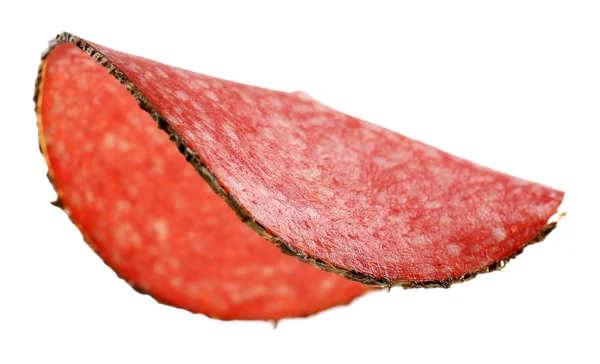 Fatia de salame isolado no fundo branco — Fotografia de Stock