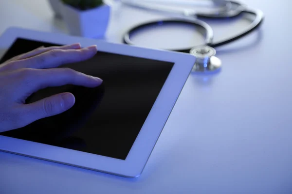 Doctor hand touching modern digital tablet, close up — Stock Photo, Image