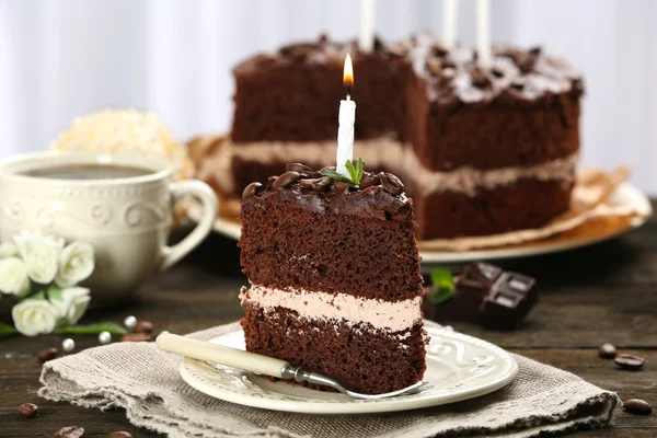 Delicious chocolate cake on table on light background — Stok Foto