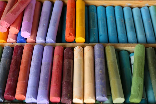 Colorful chalk pastels in box close up — Stock Photo, Image