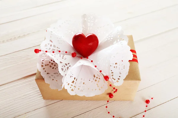 Beautiful gift box on wooden background. Valentine Day concept — Stock Photo, Image