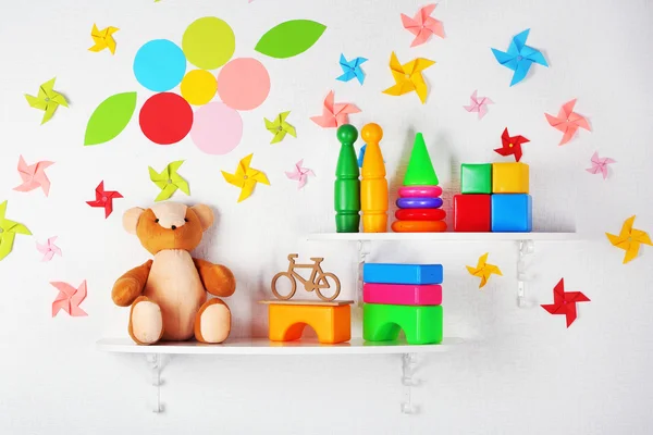 Shelves with toys in child room close-up — Stock Photo, Image