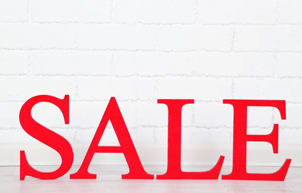 Sale on floor on bright background — Stock Photo, Image