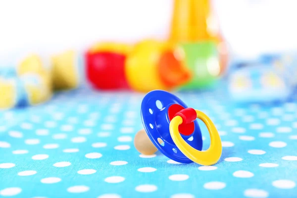 Dummy for baby, close-up, on bright background — Stock Photo, Image