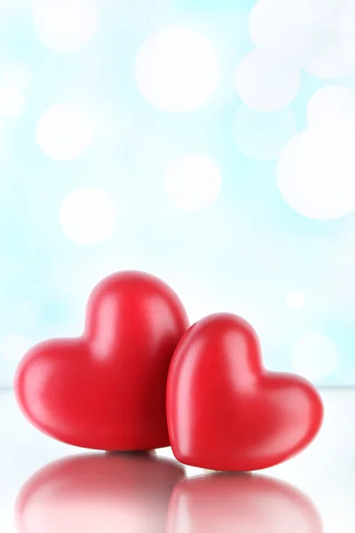 Red hearts on light background Stock Picture