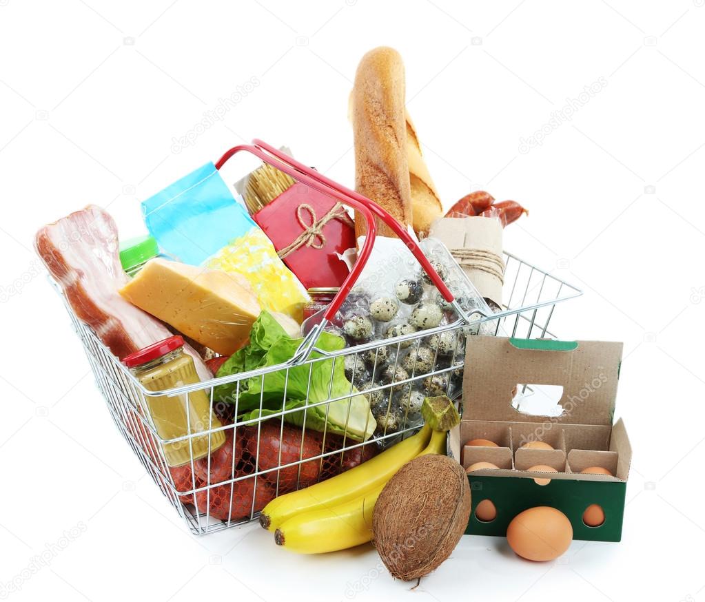 Metal shopping basket with groceries isolated on white